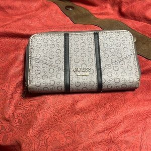 Guess wallet minor tear on the leather